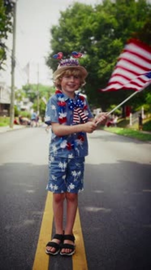Boy Celebrating with Flag on Festive Day