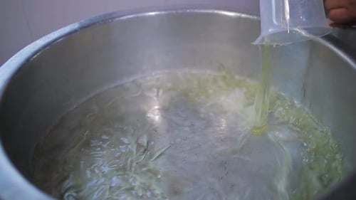 pouring oil in pan hot.