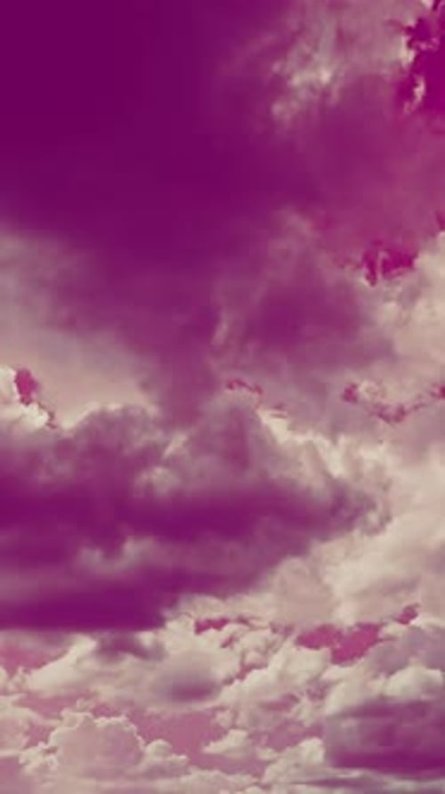 Clouds Moving in a Dreamy Pink Sky