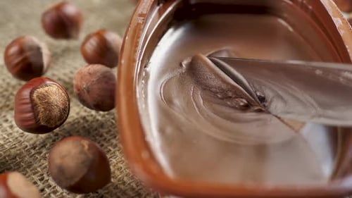 Chocolate Hazelnut Spread Being Spread with Knife