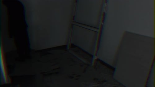 Scary Amateur Video with a Person or Creature Standing in a Corner in the Dark Horror Mysticism