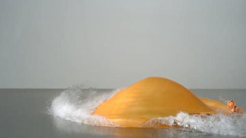Balloon Popping with Water Filling in Slow Motion