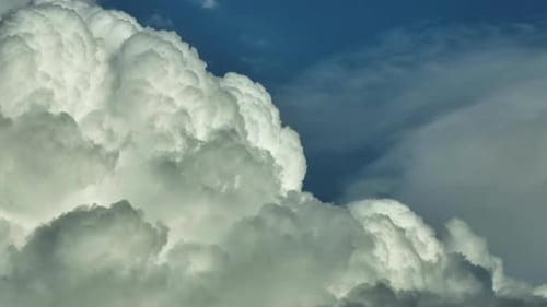 Time Lapse of White Fluffy Cumulonimbus Clouds Forming Before Thunderstorm on Summer Blue Sky Moving