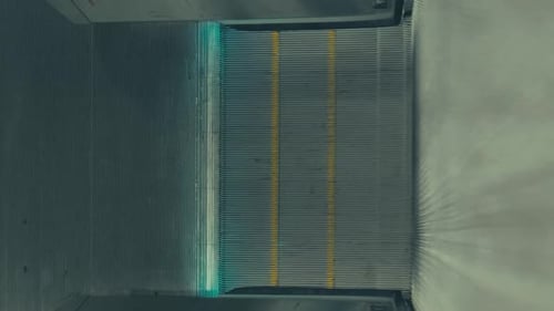 End Of An Downwards Moving Escalator In The Subway Station Of Stockholm, Sweden TILT UP At End Of Es