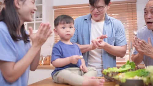 Happy Family Cooking in Bright Kitchen