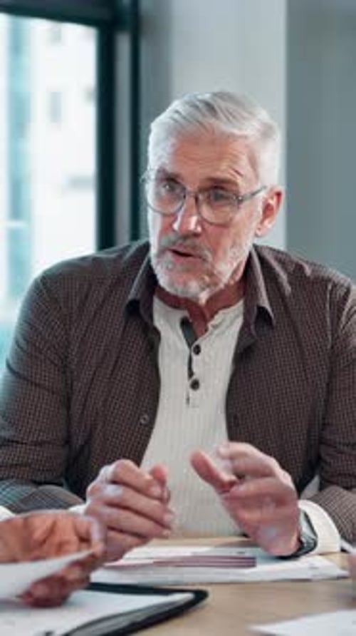 Meeting, business and man talking in office for procedure, graph growth and financial increase