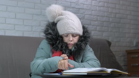 Child in Winter Clothes Studying Indoors, People Stock Footage ft ...