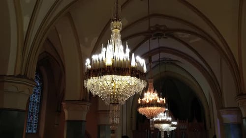 Majestic Crystal Chandeliers Illuminating Classic Church Interior Concept of Elegance and Faith