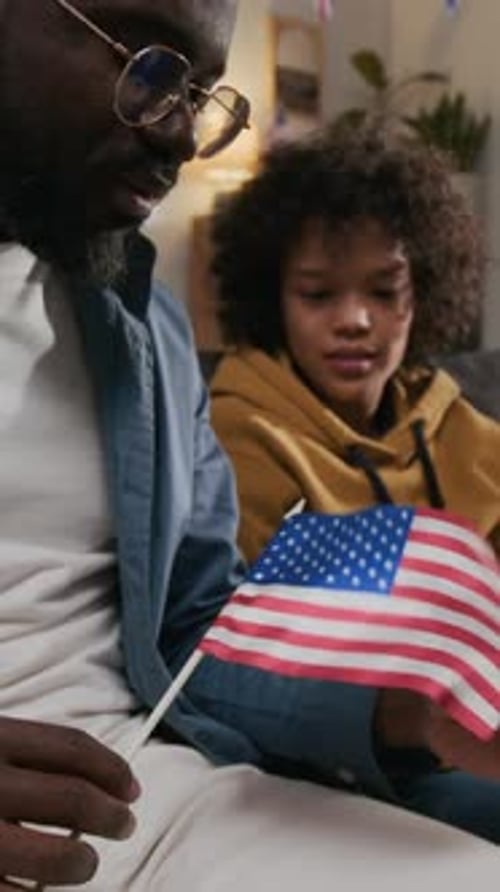 Man and Child with American Flag Together