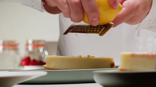 Adding Lemon Zest to Creamy Cheesecake Slice