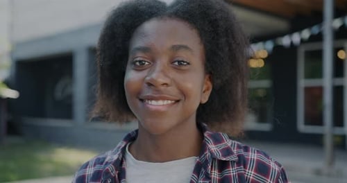 Young Adult Smiling Portrait in an Urban Setting