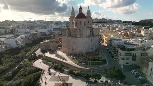 Drone Video Circling Around the Parish Church of Mellieha in Malta in Sunny Weather