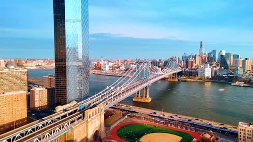 Approaching a baseball field located under the Manhattan Bridge. Stunning New York scenery