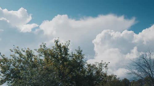 Clouds Drifting By on a Sunny Day