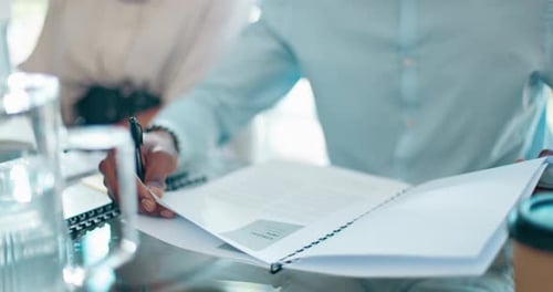 People Reviewing Documents in an Office