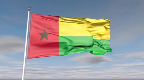 Realistic Guinea-Bissau Flag Waving Against Blue Sky