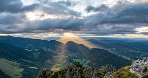 Mountains Landscape View with Clouds and Sunlight