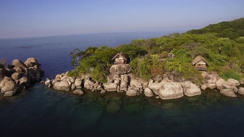 Aerial Drone Quadcopter of Luxury Water Front Hotel Resort on Island, Rustic