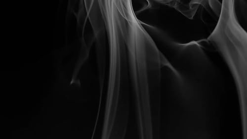 Abstract Gray Smoke Rising on a Black Background