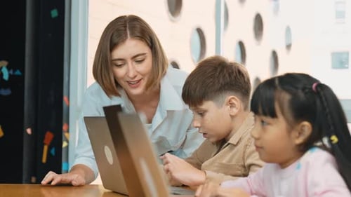 Teacher check student answer while learner using laptop. Site view. Erudition.