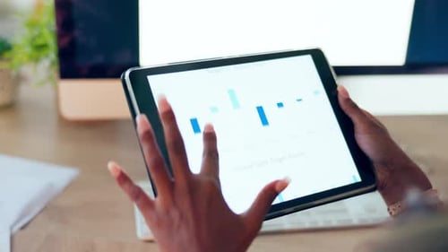 Tablet screen, hands and sales data in office for advertising, statistics and marketing targets