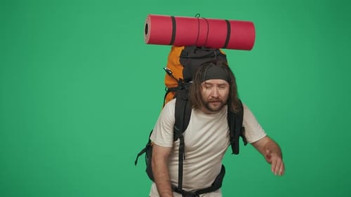 Man Tourist with Backpack Looking Lost Finds a Right Path and Calls to Go with Him Isolated on Green