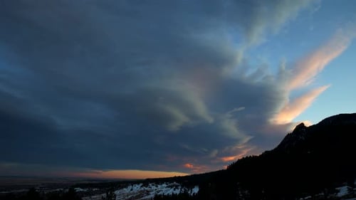 Time lapse of lenticular clouds over the Flatirons in Boulder, Colorado