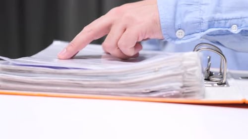 Closeup Office Worker Man Lawyer Carefully Reads a Document