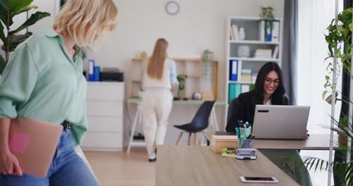 Team of Young Office Workers Starting Their Day