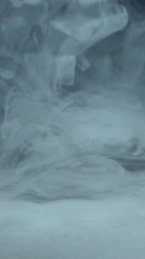 White Smoke Vertical Floating On A Black