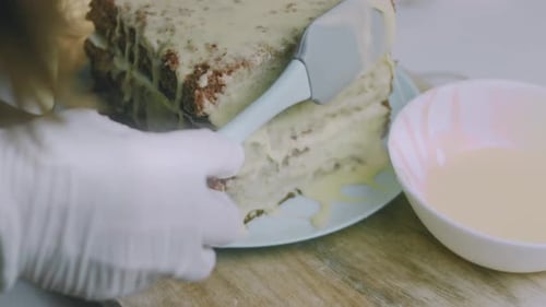 I Spread the Cream on the Square Cake Crusts Christmas Atmosphere with Lights in the Background