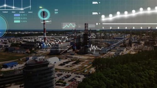 Aerial view of an industrial plant, complete with digital charts and graphs.