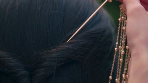 Hair Style Adorned with Gold Accessory