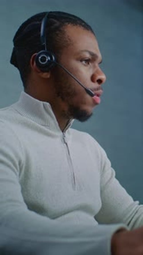 Call Center Office African American Technical Support Specialist Provides Online Customer Service