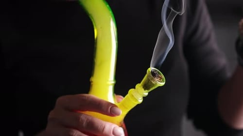 Female Smoking Marijuana Thc And Cbd With Bong For High And Relax