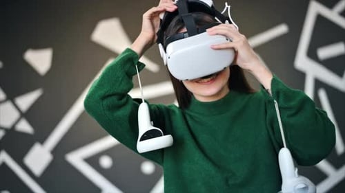 Woman Puts On Virtual Reality Headset Smiling