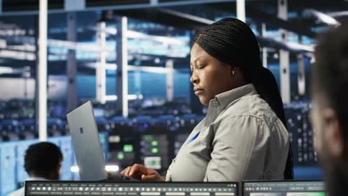 Portrait of Joyous Server Hub Technician Using AI Visualization Insights