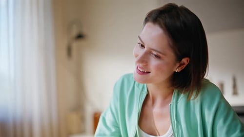 Woman Talking During Online Meeting at Home