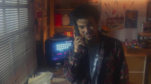 Young Man Finishing Phone Call