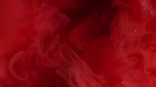 Abstract Red and Pink Glittery Ink Swirl