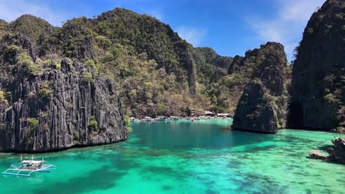 Turquoise Waters Surround Kayangan Jetty in Coron, Philippines