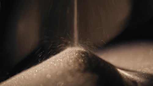 Macro Sand Running Glass Clock Counting Minutes Closeup Grains Falling Inside