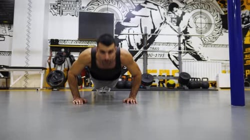 Strong Sporty Athlete Doing Different Types of Push Ups at Modern Gym Young Sportsperson Showing
