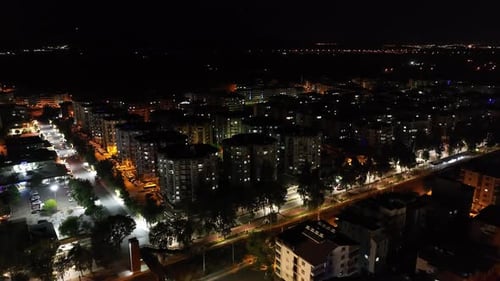 City Street and Traffic at Night Aerial View