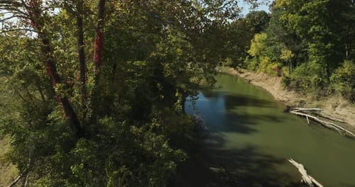 Quiet Forest With Calm River Near Twin Bridges In Arkansas, USA. Aerial Sideways Shot
