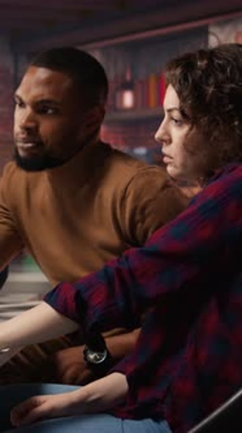 Vertical Video Teamworking Colleagues Using Computer in Software Development Agency