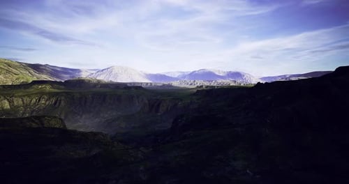 Majestic Mountain Landscape at Dusk with Shadows and Soft Light