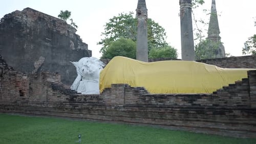 Lying Buddha Statues Draped in Yellow at Wat Yai Chai Mongkhon in Ayutthaya Thailand