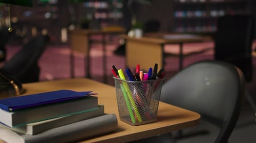 Office Desk with Books and Colorful Pens