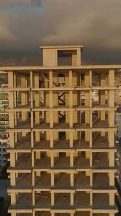 Vertical Video Exclusive Housing Development Begins As the Frame of a Residential Building Rises on